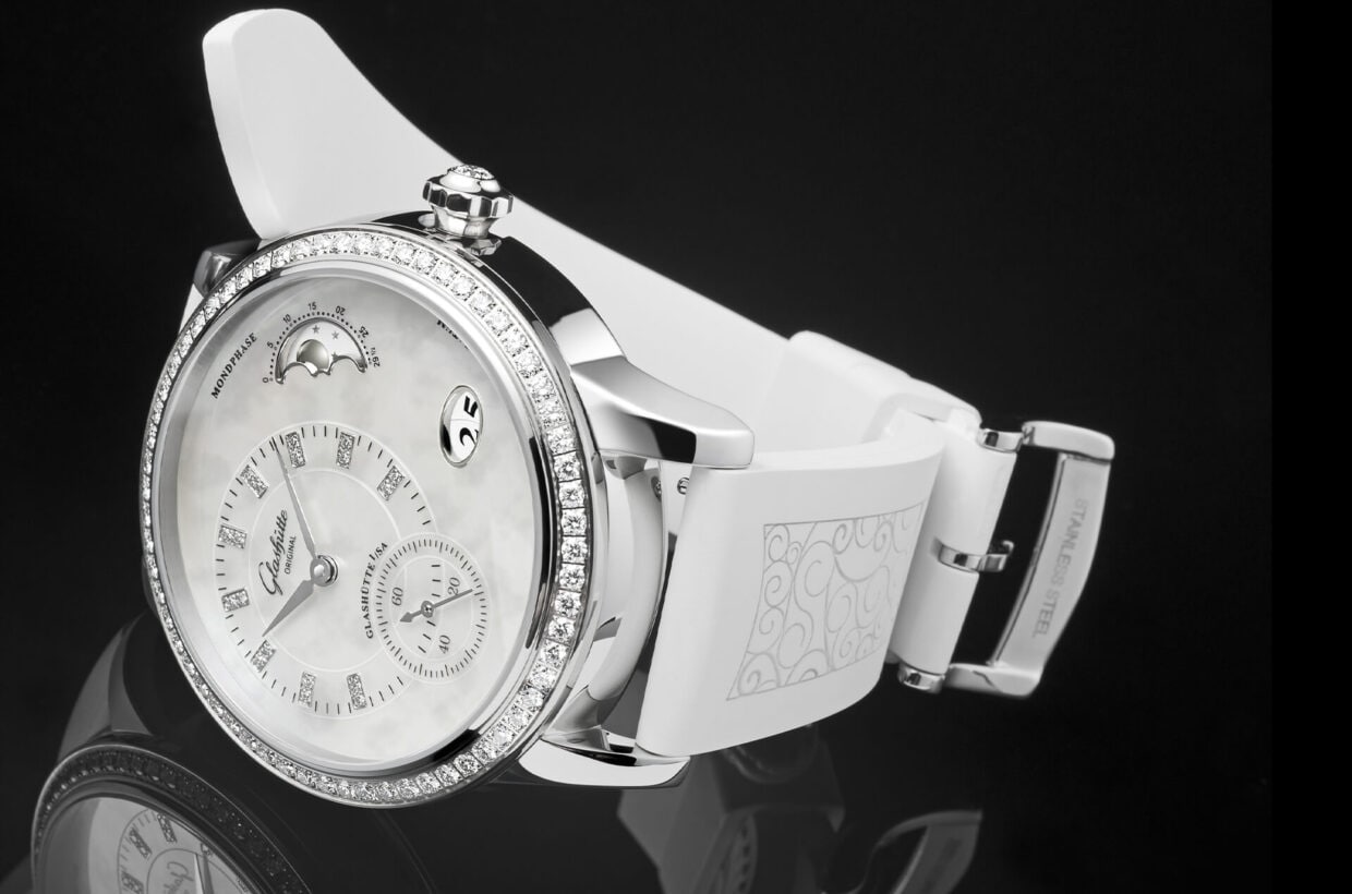 Versiones de la pulsera Piel de aligátor de Luisiana de color blanco nácar o pardo y pulsera de caucho blanca delicadamente impresa Versiones de la pulsera Piel de aligátor de Luisiana de color blanco nácar o pardo y pulsera de caucho blanca delicadamente impresa
