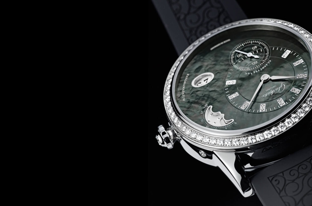 Mother-of-pearl dial Dark grey “Tahiti” mother-of-pearl, rod indexes set with a total of 18 brilliant-cut diamonds, white gold hands Mother-of-pearl dial Dark grey “Tahiti” mother-of-pearl, rod indexes set with a total of 18 brilliant-cut diamonds, white gold hands