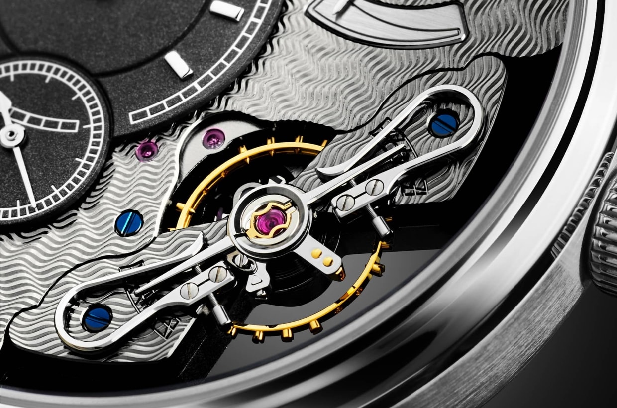 Offenbarung innerer Schönheit Die neue PanoInverse – Limitierte Edition in Platin ist eine ganz besondere Interpretation der Idee, die innere Schönheit des Uhrwerks auf der Vorderseite der Uhr zu präsentieren. Dafür wurden zahlreiche Komponenten, die normalerweise nur durch den Saphirglasboden zu sehen sind, invers gelagert und verschiedene Einzelteile und Baugruppen neu entwickelt. Offenbarung innerer Schönheit Die neue PanoInverse – Limitierte Edition in Platin ist eine ganz besondere Interpretation der Idee, die innere Schönheit des Uhrwerks auf der Vorderseite der Uhr zu präsentieren. Dafür wurden zahlreiche Komponenten, die normalerweise nur durch den Saphirglasboden zu sehen sind, invers gelagert und verschiedene Einzelteile und Baugruppen neu entwickelt.